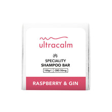 Load image into Gallery viewer, A square white package features the brand name "Ultracalm" in pink at the top. Below it, in black text, are the words "SPECIALITY CBD SHAMPOO BAR" and "100g, CBD 50mg." Infused with Natural Essential Oils, a pink stripe at the bottom reads "RASPBERRY & GIN," showcasing its anti-inflammatory properties.